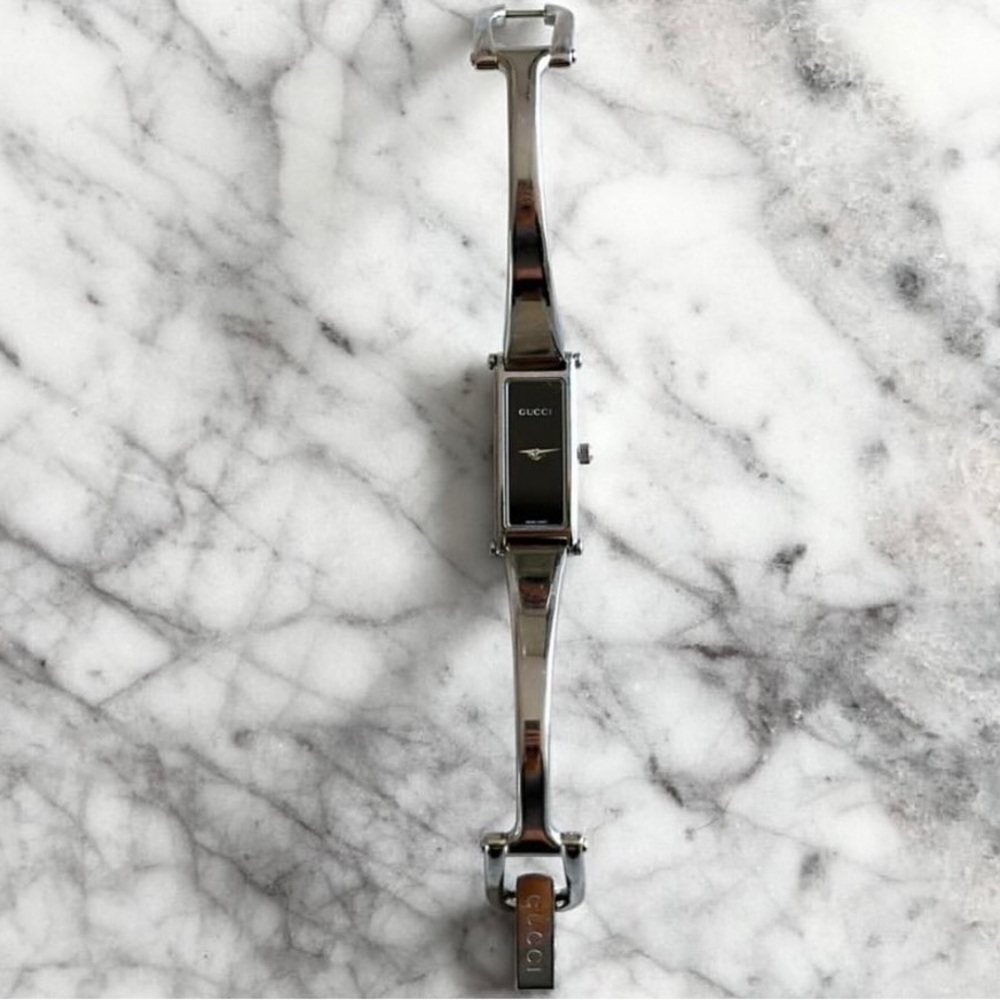 Gucci Black and Silver Watch with Sleek Design